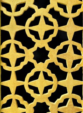 Geometrik altıgen, yıldız ve süs şeklindeki desenleri kapatın. Üç boyutlu kesme lazer kesim yıldız ve metalik altın rengi çiçek şekilleri. Kusursuz arkaplan dokusu.