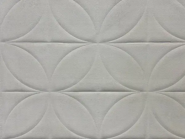 3 boyutlu gri fayanslar, çiçek ve kahve çekirdeği şekilli desenler, duvara kazınmış. Kusursuz arkaplan dokusu.