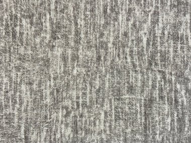 Gri ve beyaz polyester kumaş, pürüzsüz arkaplan dokusu.