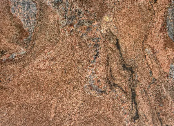 Kırmızı mermeri soyut siyah damarlarla kapatın. Doğal mermer ya da gri ve siyah taneli kırmızı granit taş dokusu. Kusursuz arkaplan dokusu.