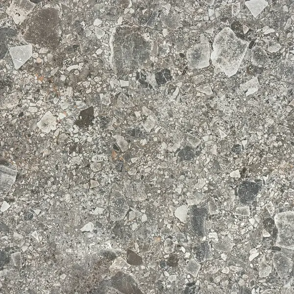Gri terrazzo granit döşeme dokusunu kapatın. Terrazzo, çağdaş kenar ve şık iç mekanlarda duvar ya da zemin kaplaması olarak giderek daha çok kullanılıyor..