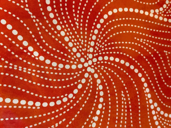 Kaleydoskop deseni gibi merkezileştirilmiş kırmızı arkaplan ile rastgele sarmal beyaz noktaları kapat. Eşsiz optik yanılsama, grafik arkaplan için uygun. 