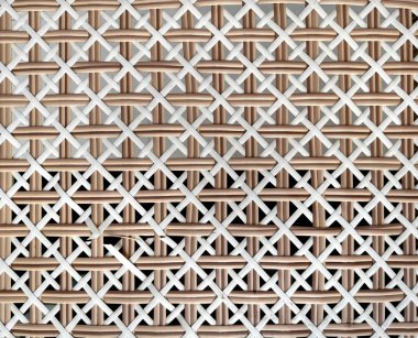 Güzel el dokuması sentetik rattan dokusunu doğal kahverengi ve beyaz renklerle kapatın. Hasır sanatı ya da rattan dokuma sanatı pek çok şekilde şekillenmiştir. Kusursuz doku.