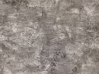 Bir yüzeyde dekoratif gri desenli boya. Rastgele fırça darbeleri, grunge ve toprak desenli pürüzlü gri beton boya. Kusursuz arkaplan dokusu.