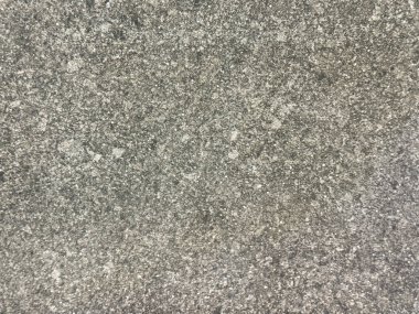 Siyah ve beyaz noktalı doğal gri taş dokuyu kapat, pürüzlü yüzeyler. Kusursuz arkaplan.