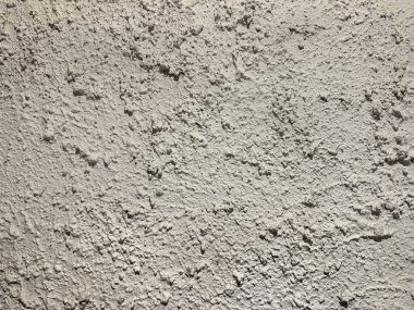 Duvarda ya da panelde dekoratif beyaz desenli boya var. Rastgele grunge ve toprak desenli beyaz boya. Kusursuz arkaplan dokusu.