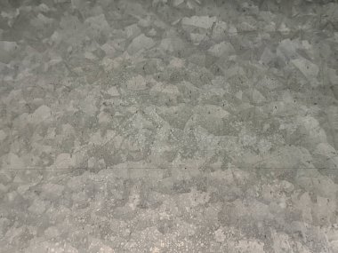 Duvardaki ya da paneldeki dekoratif gri desenli boya. Gri boya rastgele bir grunge ve toprak desenle yıkanmış. Kusursuz arkaplan dokusu.