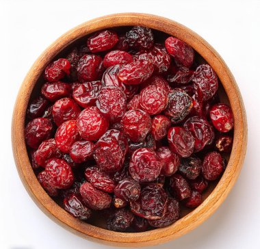 Kurutulmuş meyve karışımı. Sağlıklı yemek. Yaban mersini yukarıdan beyaz tahta masaya yayılmış.