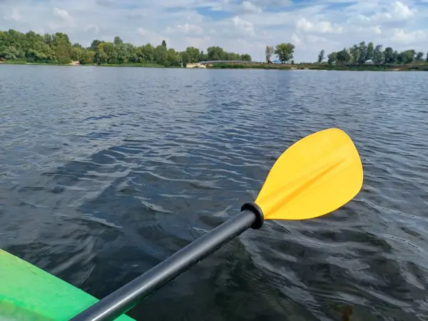 stock image Kayaking on a Calm River with a Yellow Paddle. Foto