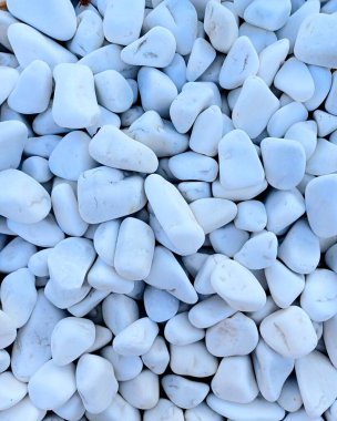 Smooth White River Pebbles Background. Little sea pebbles foto clipart