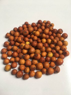 Top view of small Bair Fruit of Asia. Pattern background of Jujube Fruit Bair Fruit or China Apple in Punjab, Pakistan. clipart