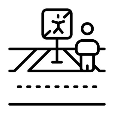 Yaya geçidi tabelasının yanında duran kişi.