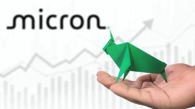 New York- USA, 23 Jan 2025: MICRON Stock Uptrend with Selective Focus on green origami Bull, symbolising MICRON Bullish market trend. Captures the concept of Financial Growth clipart