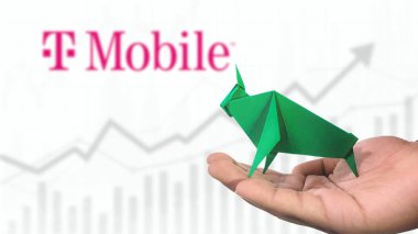 New York- USA, 23 Jan 2025: T MOBILE Stock Uptrend with Selective Focus on green origami Bull, symbolising  T MOBILE Bullish market trend. Captures the concept of Financial Growth clipart