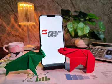 Newyork, USA- 15 Dec 2024: Selective Focus on AEP AMERICAN ELECRIC POWER Inc stock market analysis featuring charts, graphs, calculator, and coffee, with AEP AMERICAN ELECRIC POWER Inc logo on a smartphone for financial insights clipart