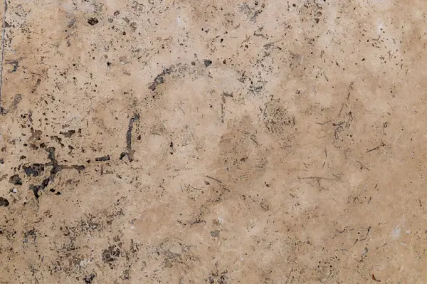 Çatlaklar ve çizikler olan beton duvarın dokusu arka plan olarak kullanılabilir.