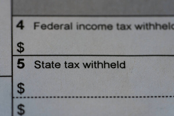 "State tax witheld" in focus on tax form.  