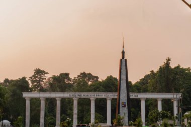 Bogor, Indonesia - september 2024: Kujang Monument and are The Icon Of Bogor City on a day afternoon. Kujang means a traditional weapon of the Sundanese clipart