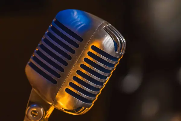 stock image Retro microphone in the studio. Old retro dynamic microphone for singing.