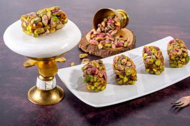 Discover the rich flavors of traditional oriental sweets made with crunchy pistachios. Perfect for dessert lovers, these authentic treats blend nutty and sweet tastes for a delightful experience. clipart