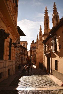 Street of the ancient city with a cathedral clipart