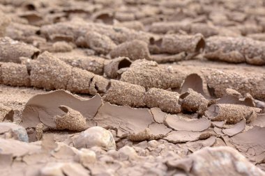 Kuru çamur bukleleri yakından çekildi, makro. Bulanık çözünmüş muda grafik kaynak, yaratıcı tasarım, yüzeyler ve arkaplanlar.