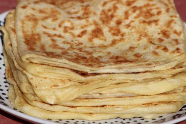 A close-up of the traditional Moroccan flatbread known as msemmen or msemen clipart