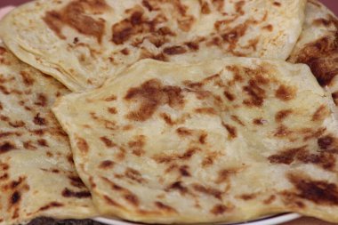 A close-up of the traditional moroccan flatbread known as msemmen clipart