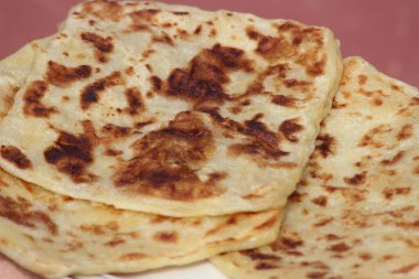 A close-up of the traditional moroccan flatbread known as msemmen clipart