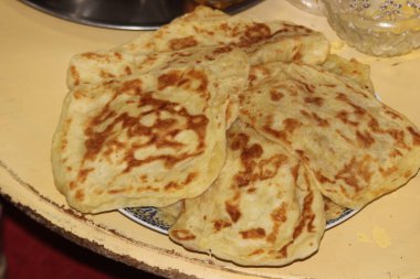 Geleneksel Fas Düz Ekmeği Meclis Üyesi ya da Msemen olarak bilinir.