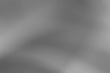 Hassas, ince gri bir gradyan arkaplan. Tasarımlar için sakin ve abartısız bir zemin oluşturmak için mükemmel..