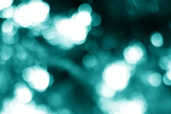 Büyüleyici deniz mavisi bokeh şelaleleri ruhani ihtişam ve karmaşık dokusal derinlik sergiler, çeşitli yaratıcı çabalar için mükemmel bir arka plan yaratır..