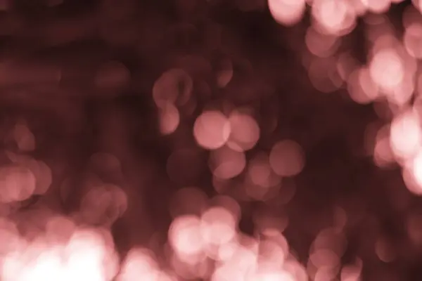 Soyut pembe Bokeh ışıkları rüya gibi, bulanık bir etki yaratıyor, arka plan için mükemmel ve büyülü dokunuşlu yaratıcı projeler..