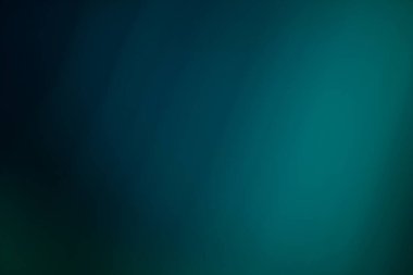 Düz yeşil ve koyu mavi tonları olan soyut bir arkaplan. Bulanık dokusu rüya gibi ve ruhani bir etki yaratıyor. Modern ve zarif bir duvar kağıdı ya da arka plan olarak kullanmak için mükemmel..