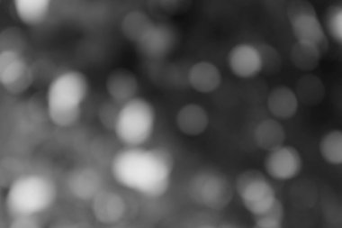 Sanatsal tasarımlar ve arka planlar için ince gri tonlu bokeh dokusu ideal