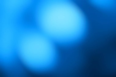 Pürüzsüz gradyan ve parlak dairesel renklere sahip sakin mavi soyut