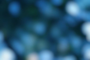 Bulanık mavi ve bokeh soyut dokusu pürüzsüz bir eğimle