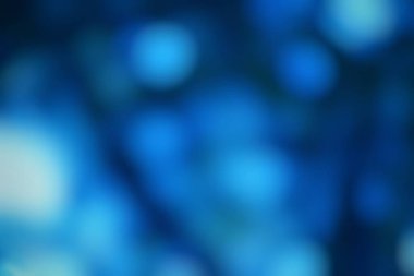 Yumuşak bir odak mavi soyut, rahatlatıcı ve modern bir zemin oluşturur.