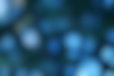 Bulanık mavi renkler, hafif ışık difüzyonu ile soyut, rahatlatıcı bir arka plan oluşturur