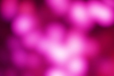 Yaratıcı kullanım için bulanık bokeh ışıkları olan soyut mor ve pembe arkaplan