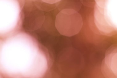 Yumuşak, sıcak, soyut bir bokeh zarif bulanık bir arka planı var.