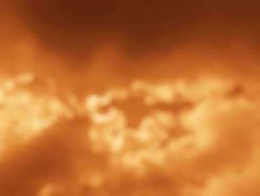 Yumuşak kehribar renginde duman bulutlar gibi, rüya gibi soyut bir arkaplan