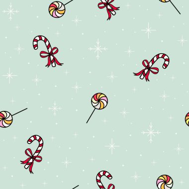 Nane yeşili arka planda yıldızlı lolipoplar ve şeker kamışları içeren renkli şeker desenleri.