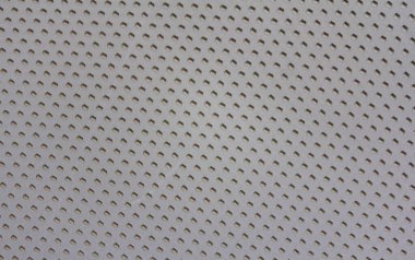 Lastik kedi kumu arka yüzey, bal eşleşmesi şekli, bej rengi, tasarım için soyut arkaplan, üst görünüm. Hayvan Malzemeleri