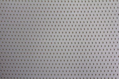 Lastik kedi kumu arka yüzey, bal eşleşmesi şekli, bej rengi, tasarım için soyut arkaplan, üst görünüm. Hayvan Malzemeleri