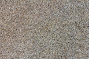 Kum yüzeyi arkaplan detayına sahip beton duvar