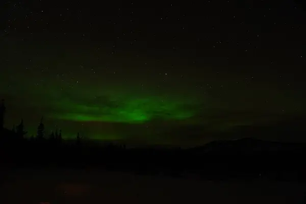 Kuzey Işıkları ya da Yukon Kanada 'da Aurora Borealis olarak da bilinir.