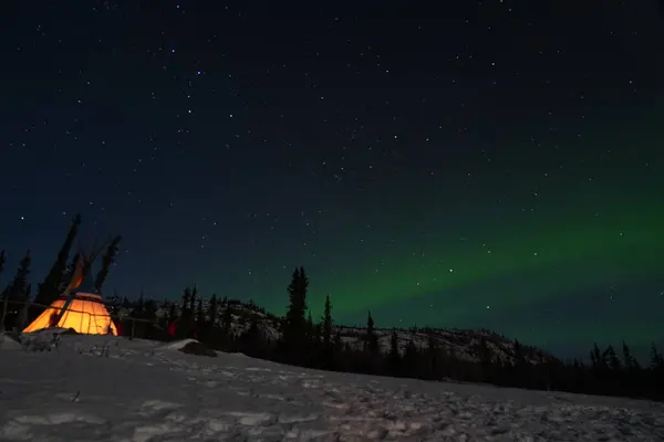 stock image Northern Lights or also called aurora borealis in Yukon Canada