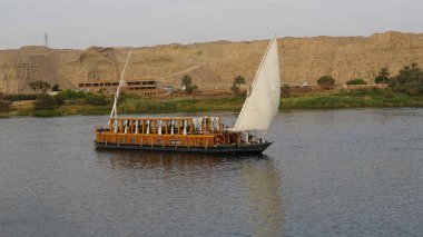 One boat in the river Nile in Egypt near by Aswan clipart