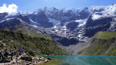 Salkantay Mountain Hike, with the lagoon Humantay and a river in Peru clipart